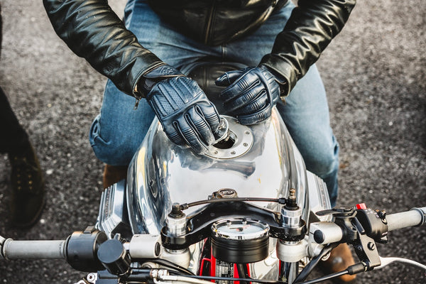 Leather motorcycle gloves with a vintage moto guzzi motorcycle