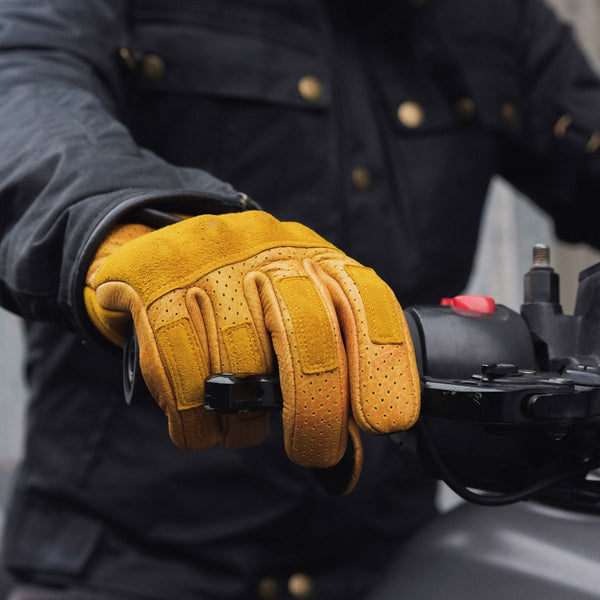 Luxury leather motorcycle gloves with yellow suede and perforated leather with knuckle protection covered in Suede.